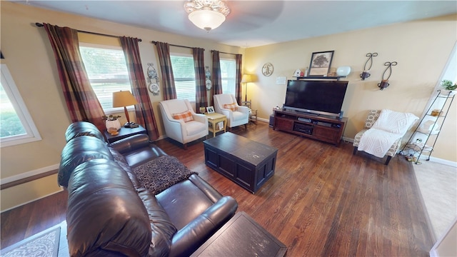 602 Maple Dr, Catlin, IL 61817 - living area featuring plenty of natural light, dark wood-style flooring, and a ceiling fan