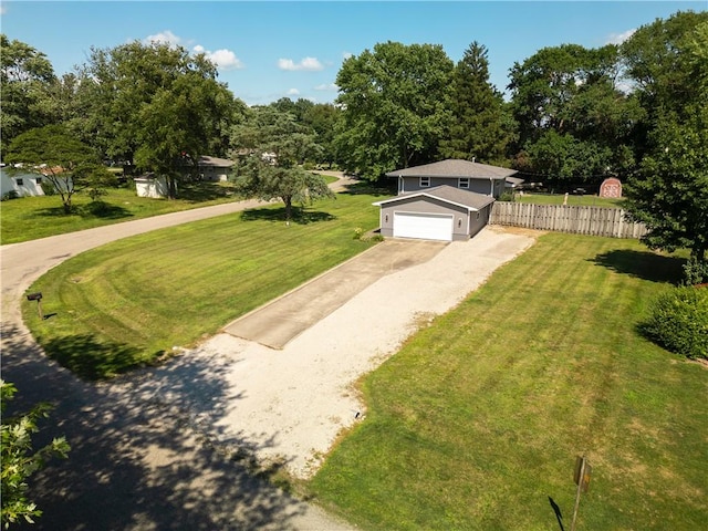 602 Maple Dr, Catlin, IL 61817 - view of yard featuring gravel driveway and an attached garage