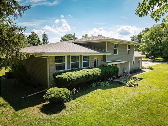 602 Maple Dr, Catlin, IL 61817 - view of home's exterior with a yard and a central AC unit
