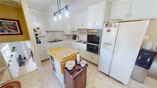 602 Maple Dr, Catlin, IL 61817 - kitchen featuring white refrigerator with ice dispenser, white cabinets, and light countertops