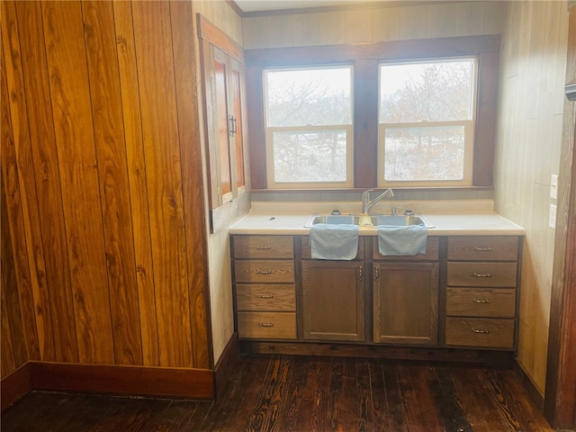 bathroom featuring hardwood / wood-style floors, vanity, and wooden walls