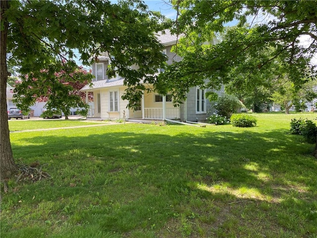 902 1st St, Charleston, IL 61920 - obstructed view of property with a front lawn