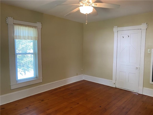 902 1st St, Charleston, IL 61920 - spare room with hardwood / wood-style flooring, ceiling fan, and baseboards
