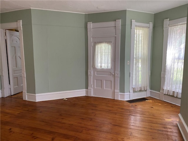 902 1st St, Charleston, IL 61920 - foyer featuring hardwood / wood-style floors, ornamental molding, and baseboards