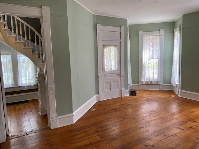 902 1st St, Charleston, IL 61920 - foyer with hardwood / wood-style floors, stairway, and baseboards