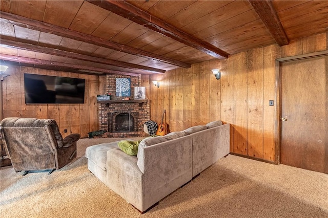 685 E Main St, Warrensburg, IL 62573 - carpeted living room with a wooden ceiling with exposed beams, wooden walls, and a fireplace