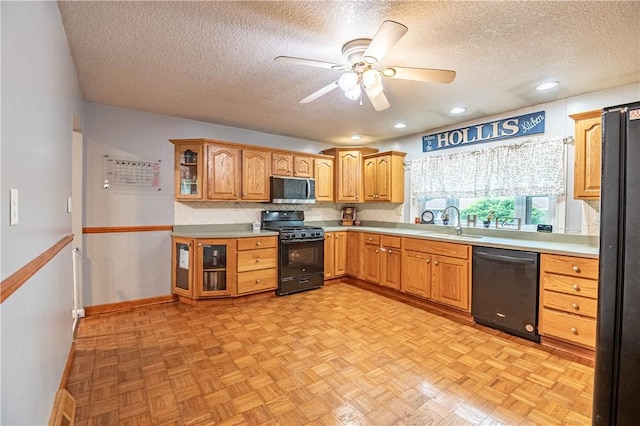 685 E Main St, Warrensburg, IL 62573 - kitchen featuring gas stove, stainless steel microwave, dishwashing machine, a textured ceiling, and glass insert cabinets