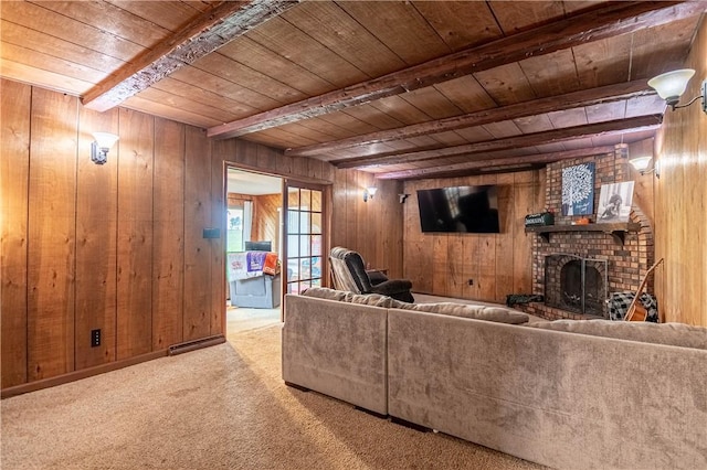 685 E Main St, Warrensburg, IL 62573 - carpeted living room with a wood ceiling with exposed beams, wood walls, and a fireplace