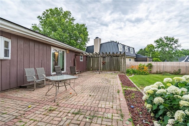 685 E Main St, Warrensburg, IL 62573 - fenced backyard featuring a patio area