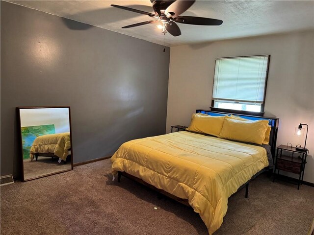 102 W Adams St, Toledo, IL 62468 - carpeted bedroom featuring a ceiling fan and baseboards