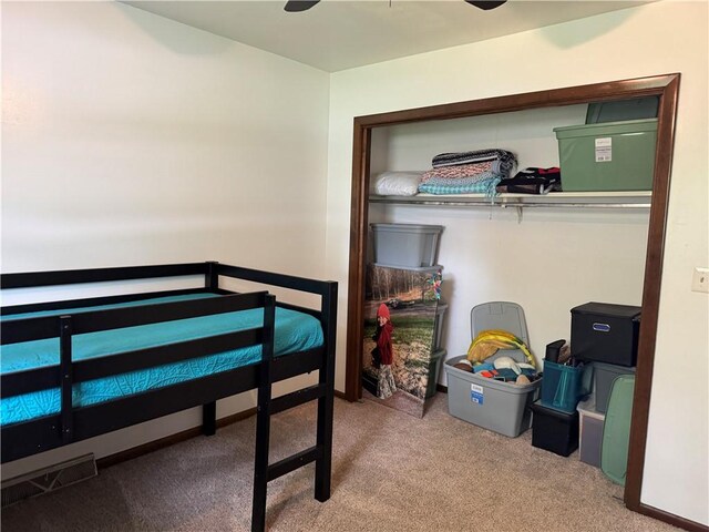 102 W Adams St, Toledo, IL 62468 - carpeted bedroom featuring a ceiling fan