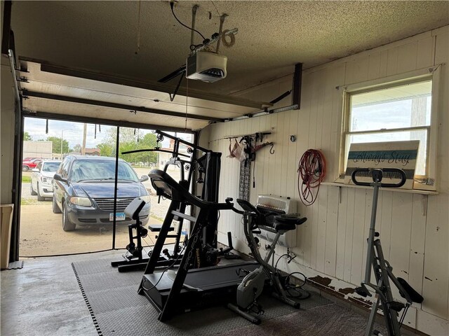 102 W Adams St, Toledo, IL 62468 - workout area featuring a garage and plenty of natural light