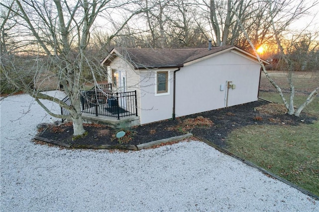 view of property exterior at dusk