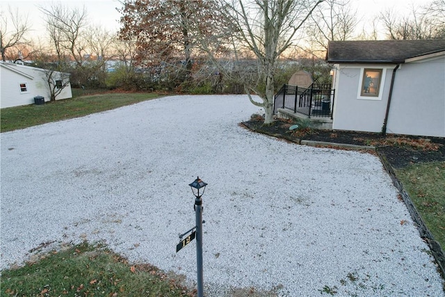 view of yard at dusk