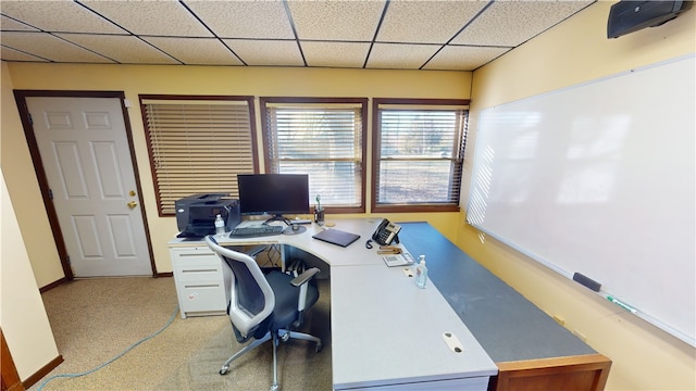 office with a paneled ceiling