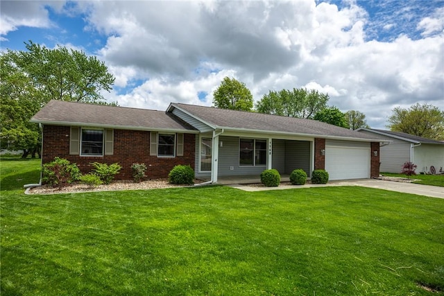1108 Collins Dr, Effingham, IL 62401 - single story home featuring brick siding, a garage, driveway, and a front lawn