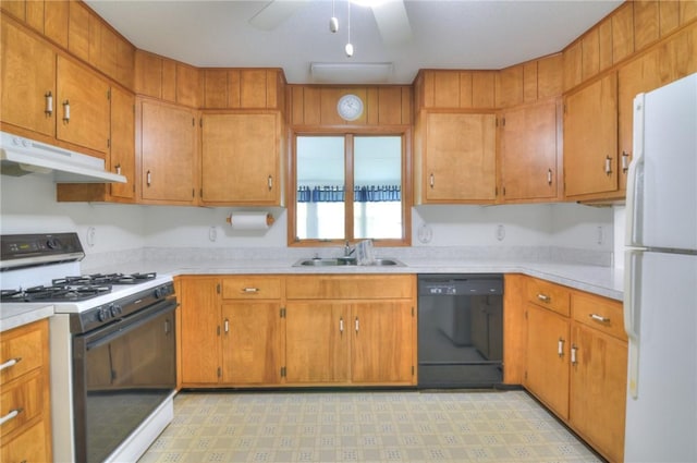 325 S Durfee St, Warrensburg, IL 62573 - kitchen featuring white appliances, under cabinet range hood, light countertops, and brown cabinetry