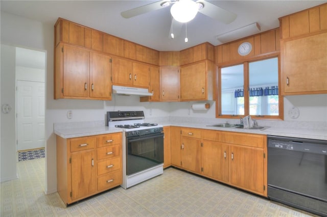 325 S Durfee St, Warrensburg, IL 62573 - kitchen with dishwasher, white gas stove, under cabinet range hood, and light countertops