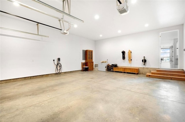 9219 E Best Ct, Effingham, IL 62401 - garage with a garage door opener and recessed lighting