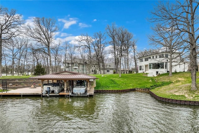 9219 E Best Ct, Effingham, IL 62401 - dock area with a water view, a lawn, and boat lift