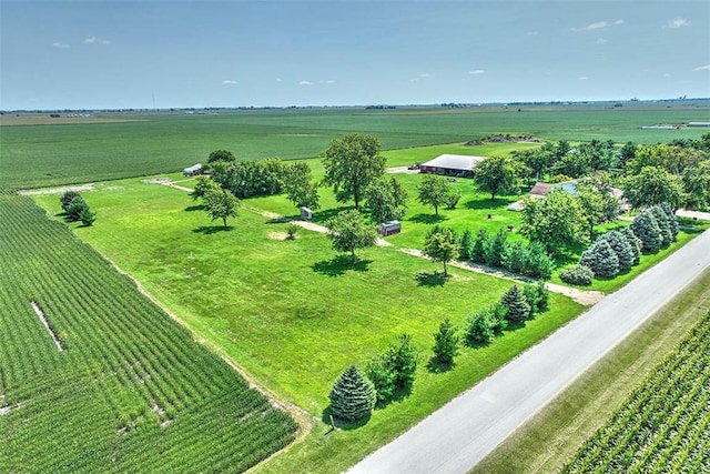 birds eye view of property with a rural view