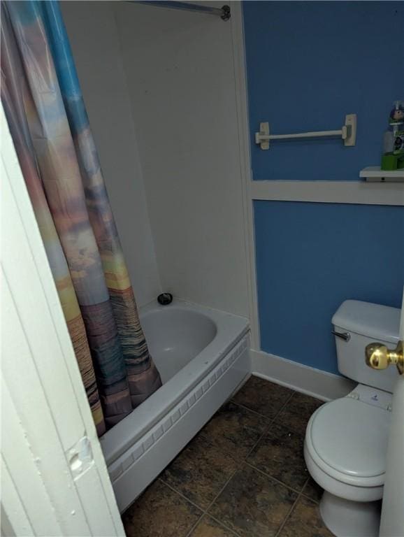 321 N 16th St, Mattoon, IL 61938 - full bathroom featuring toilet, shower / bath combo, and baseboards