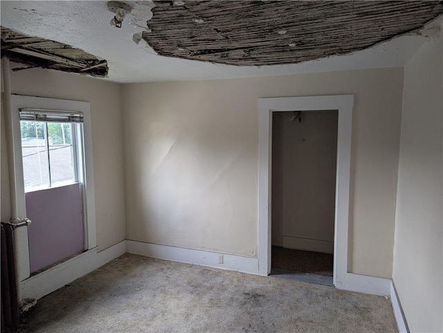 321 N 16th St, Mattoon, IL 61938 - unfurnished room featuring carpet flooring and baseboards