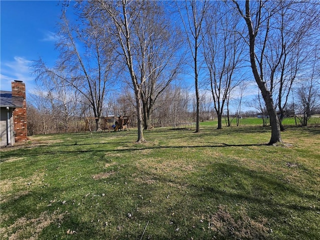 view of yard with a playground