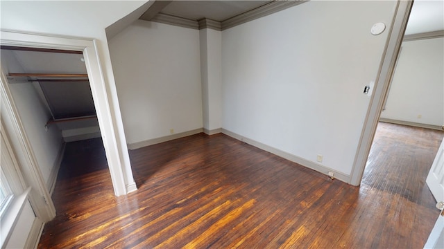 1204 N Franklin St, Danville, IL 61832 - unfurnished bedroom with hardwood / wood-style flooring, baseboards, and crown molding