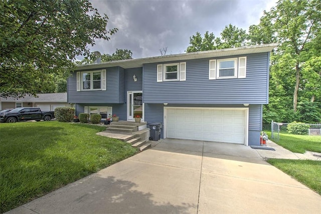 1065 S Wildwood Dr, Mt Zion, IL 62549 - raised ranch featuring a garage and driveway