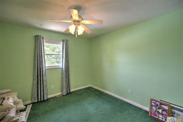 1065 S Wildwood Dr, Mt Zion, IL 62549 - carpeted empty room with ceiling fan and a textured ceiling