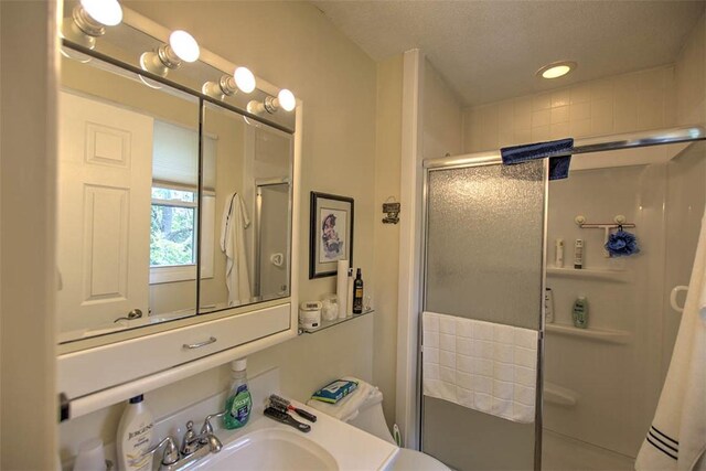1065 S Wildwood Dr, Mt Zion, IL 62549 - bathroom featuring a shower stall, vanity, and recessed lighting
