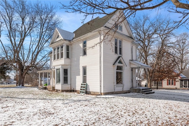 view of snow covered property