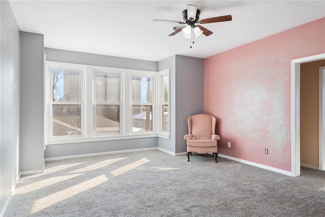 unfurnished room with light carpet and ceiling fan