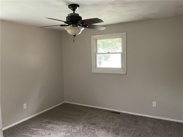 1696 W Evandale Dr, Decatur, IL 62526 - carpeted empty room with baseboards and a ceiling fan