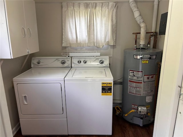 1413 13th St, Charleston, IL 61920 - laundry area featuring gas water heater, washing machine and clothes dryer, cabinet space, and dark wood-type flooring