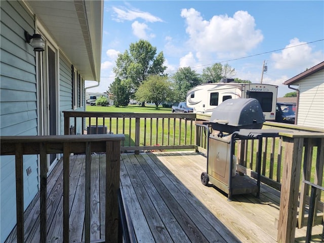 803 S Lafayette St, Newton, IL 62448 - wooden deck with a lawn and a grill