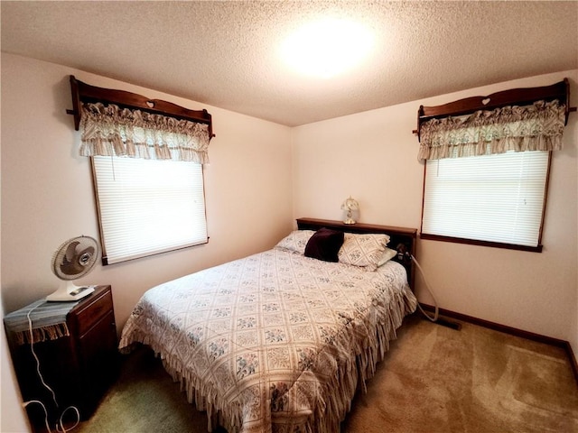 803 S Lafayette St, Newton, IL 62448 - carpeted bedroom featuring multiple windows and a textured ceiling