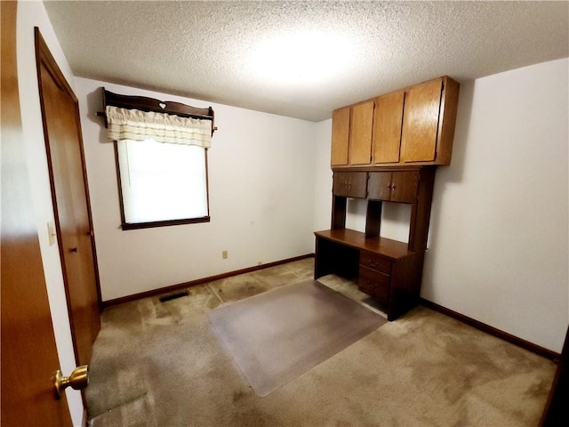 803 S Lafayette St, Newton, IL 62448 - unfurnished office with a textured ceiling and light colored carpet