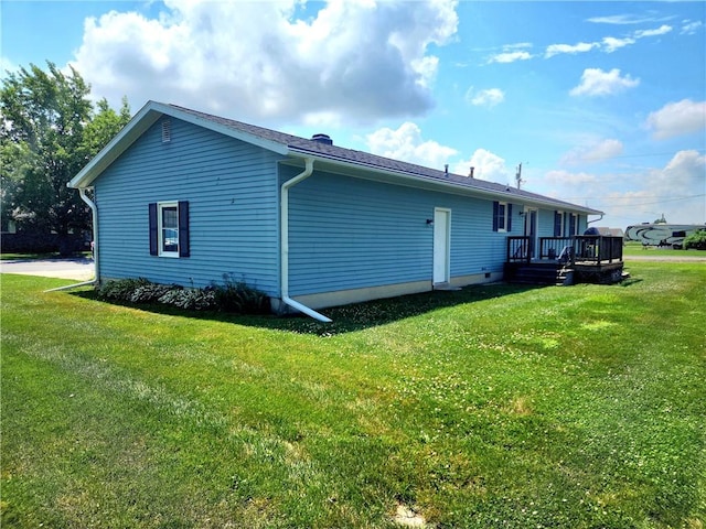 803 S Lafayette St, Newton, IL 62448 - view of side of property with a deck and a lawn