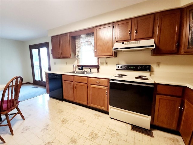 803 S Lafayette St, Newton, IL 62448 - kitchen with white range with electric stovetop, black dishwasher, under cabinet range hood, light countertops, and light flooring