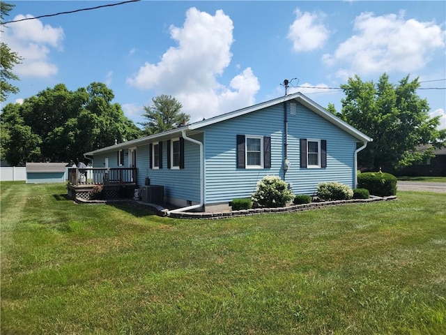 803 S Lafayette St, Newton, IL 62448 - view of side of property with a lawn and a deck