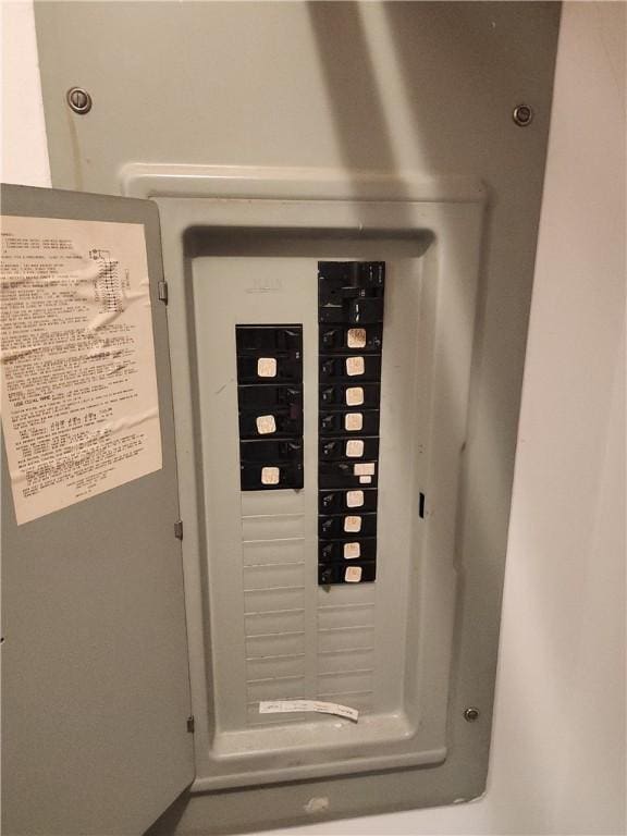 803 S Lafayette St, Newton, IL 62448 - utility room featuring electric panel