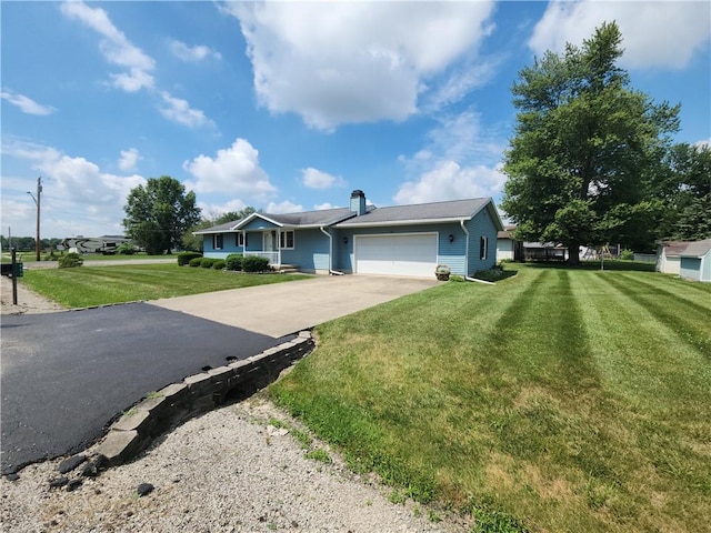 803 S Lafayette St, Newton, IL 62448 - ranch-style house with a garage, driveway, and a front yard