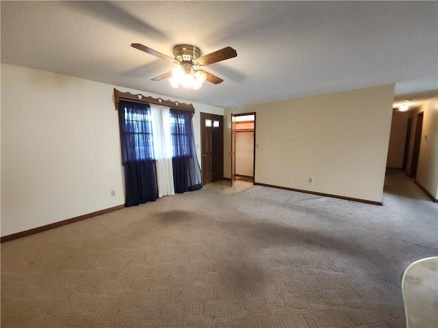 803 S Lafayette St, Newton, IL 62448 - unfurnished room featuring light carpet and ceiling fan