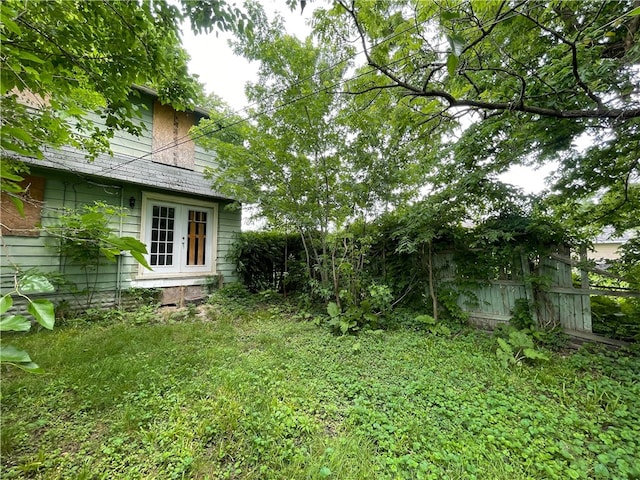 view of yard featuring french doors