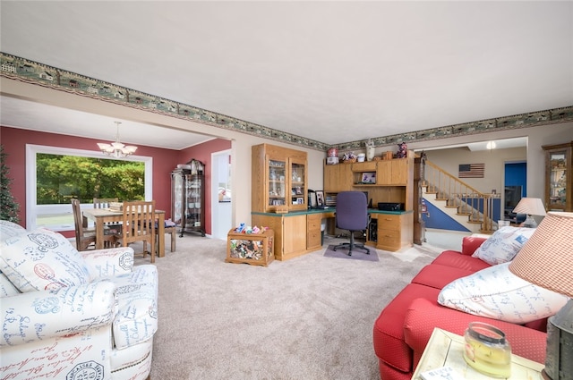 living room with light carpet, built in desk, and a chandelier