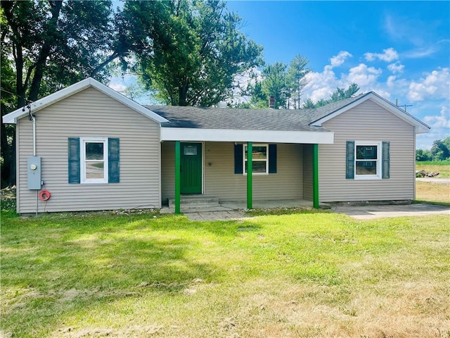 14014 E US Highway 40, Marshall, IL 62441 - view of front of home featuring a front lawn, covered porch, and a shingled roof