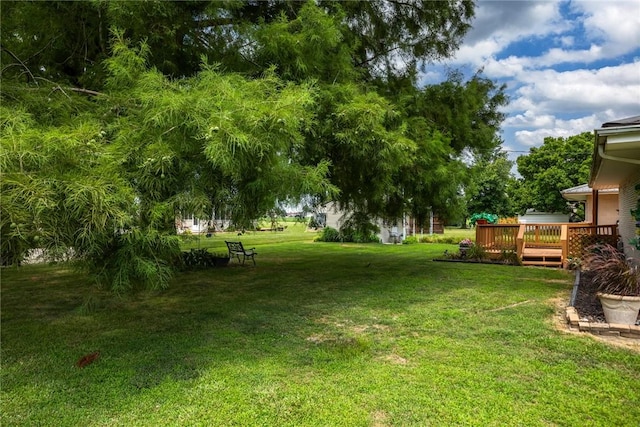 101 Willow Dr, Farina, IL 62838 - view of green lawn featuring a wooden deck