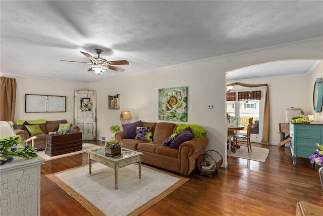 101 Willow Dr, Farina, IL 62838 - living room with a ceiling fan, arched walkways, wood finished floors, and ornamental molding